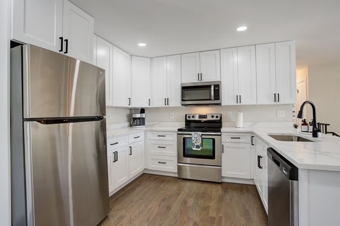 The Wolfe Den: 4BR Retreat with Game Room & Private Spa image 3