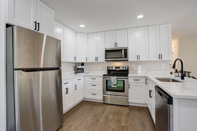 The Wolfe Den: 4BR Retreat with Game Room & Private Spa image 3