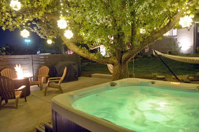 The Daphne: 4BR with Fenced Yard, Hot Tub, Home Theater + Gym image 2