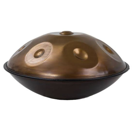 Bronze handpan steel drum with circular tone fields and black base on white background, melodic percussion instrument