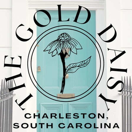 Cheerful turquoise front door framed by white trim, overlaid with a stylized black daisy emblem and text noting Charleston, South Carolina, with brass mail slot and iron railings