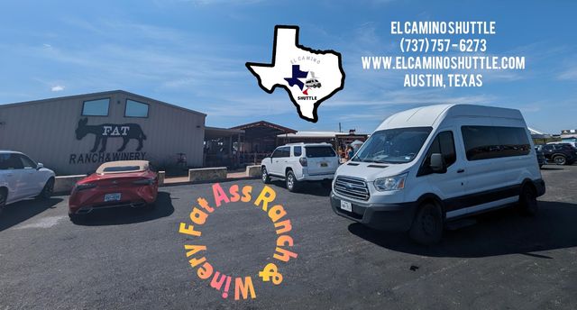 Sunny Austin, Texas winery parking lot with a barn-style tasting room and donkey logo, a white passenger shuttle van and several cars, colorful circular pavement graphic and a Texas-shaped overlay.