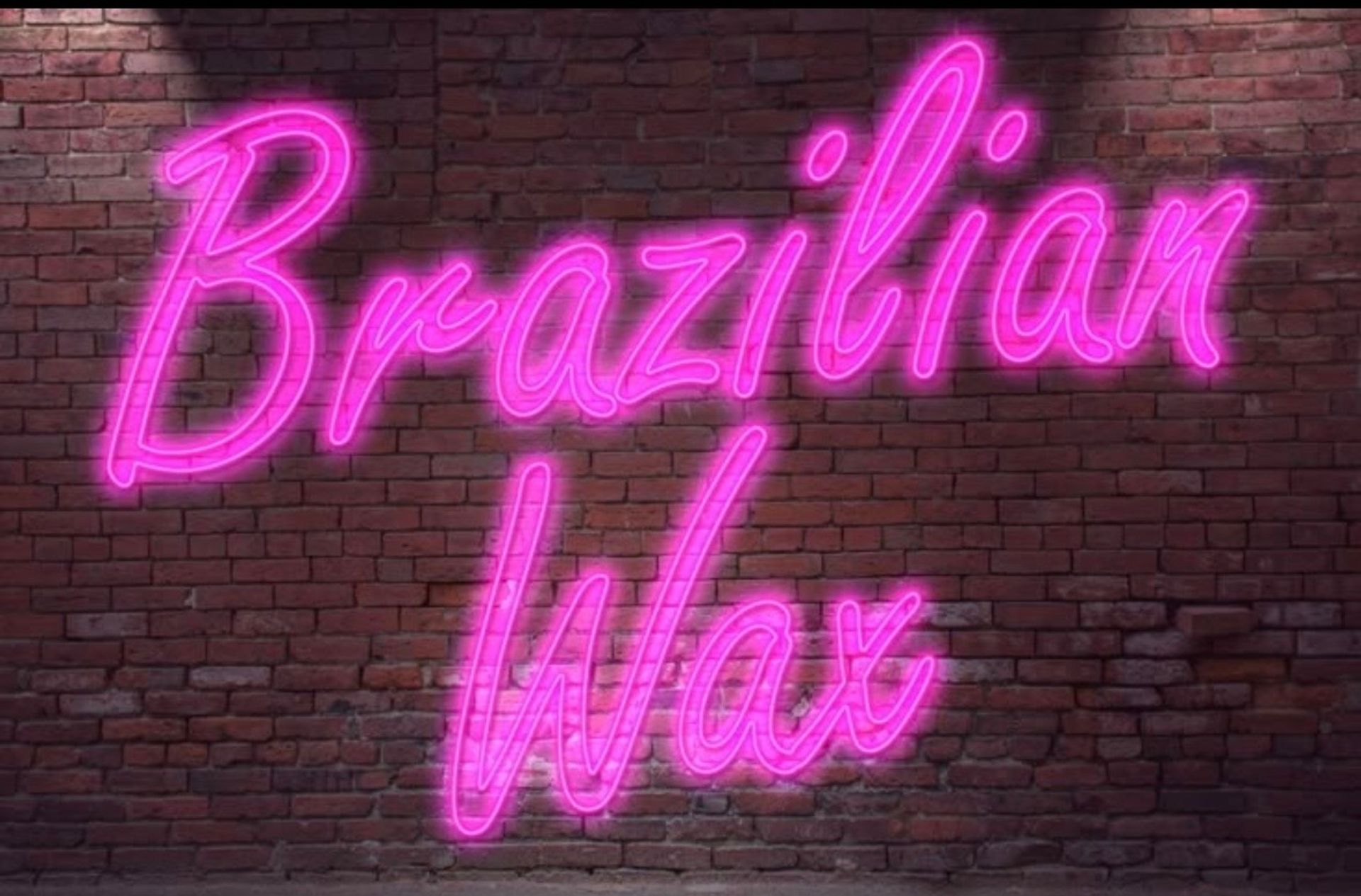 Bright pink neon sign reading 'Brazilian Wax' glowing on exposed red brick wall, urban salon/beauty aesthetic