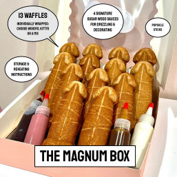 Novelty dessert box with 13 penis-shaped waffles in a pink box, plus squeeze bottles of drizzle sauces for decorating