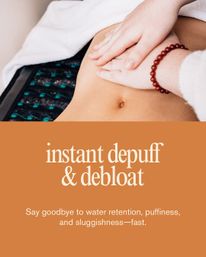 Hands-on abdominal massage on a spa table with towel and heated pad, overlay text reads “instant depuff & debloat” promoting fast de‑bloating and reduced water retention.