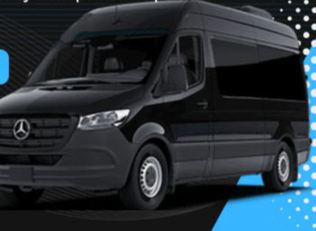 Sleek black high-roof cargo van shown in three-quarter view on a bright blue dotted promotional background