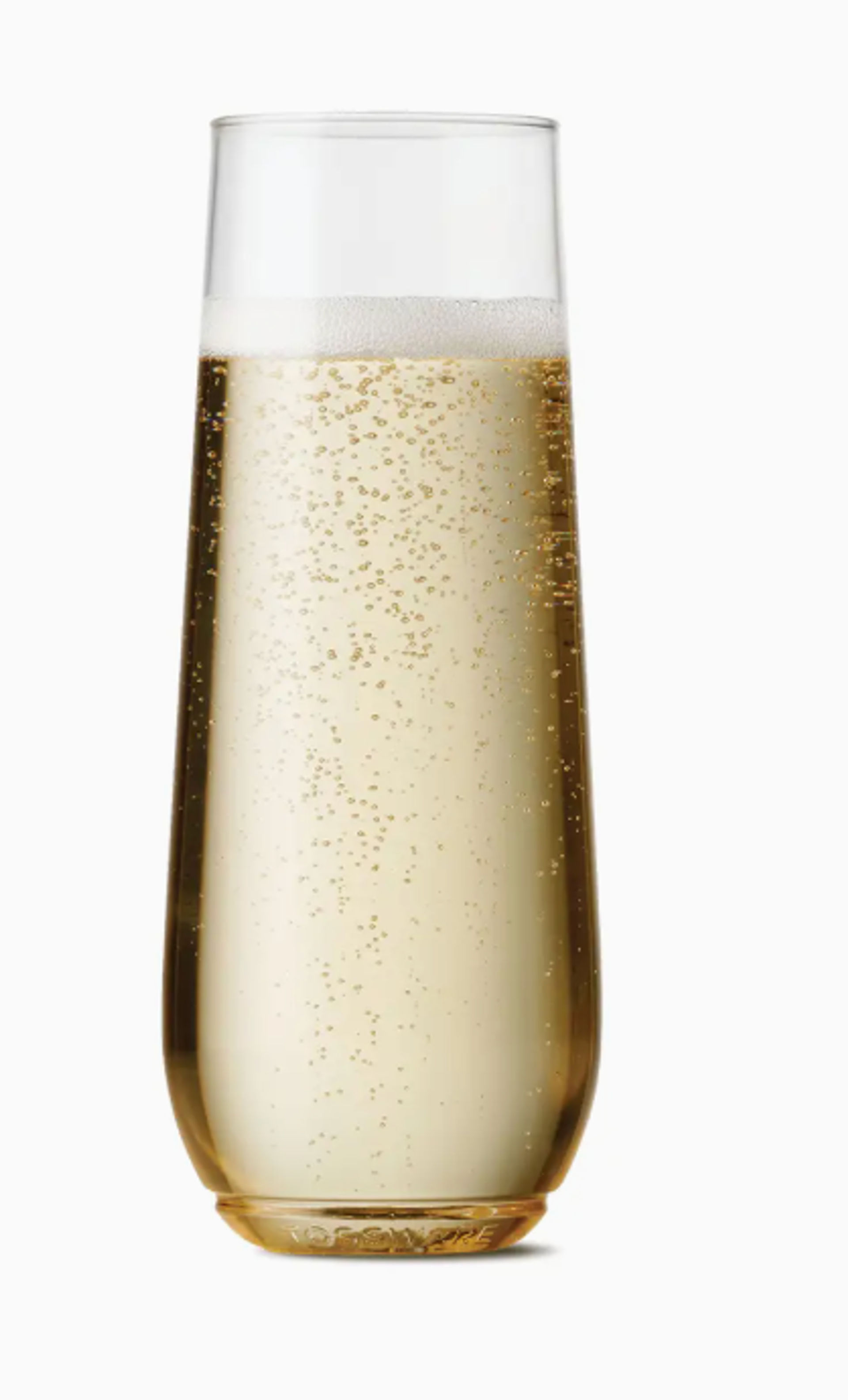 Tall champagne flute isolated on white, filled with pale golden bubbly champagne with tiny rising bubbles and a thin foamy head.