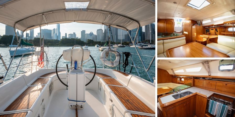 Sailboat cockpit with teak benches and helm overlooking Chicago skyline at sunset; inset wood-paneled cabin and galley interior.