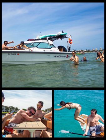 Friends enjoying a sunny day on a white motorboat anchored in shallow turquoise coastal waters off Florida, with people wading, paddleboarding and splashing nearby under a bright blue sky.
