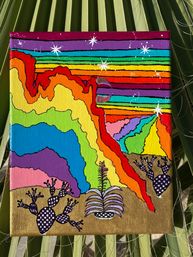 Vibrant acrylic canvas painting of a rainbow-striped desert landscape with stylized prickly pear cacti, sparkling starry sky and palm-leaf backdrop