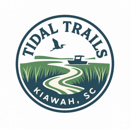 Circular coastal logo for Kiawah, SC showing a winding tidal creek through marsh grasses, a small boat on the water and a flying heron.