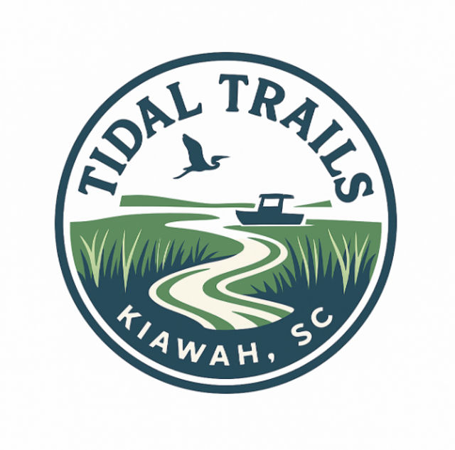 Circular coastal logo for Kiawah, SC showing a winding tidal creek through marsh grasses, a small boat on the water and a flying heron.