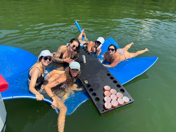 Rowdy Boat Double Decker Slide Boat at Party Cove on Percy Priest with BYOB, Huge Lily Pad, 4 Man Raft for Tubing, and More (Up to 16 Passengers) image 15