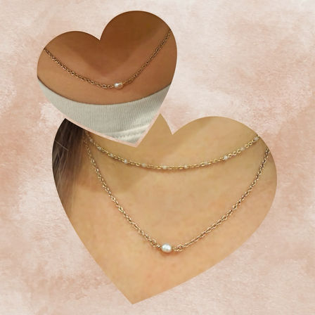 Heart-shaped collage close-up of layered dainty gold chain necklaces with tiny freshwater pearls and a single pearl pendant on a neckline, minimalist jewelry style