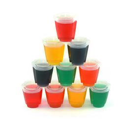 Set of 10 small plastic paint pots with clear snap-on lids in bright red, yellow, green and black, stacked in a pyramid for kids' crafts and painting projects.