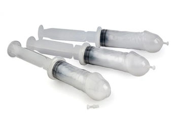 Three translucent disposable plastic syringes with plungers and small removable tips neatly arranged on a white background — medical supplies product photo.