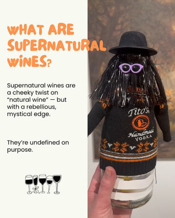 Split graphic: left panel asks What are supernatural wines? with a short definition about a cheeky, mystical twist on natural wine; right panel shows a hand holding a wine bottle dressed as a tiny spooky doll with black fringe hair, purple cat-eye sunglasses, a black hat and a patterned sweater against a blurred autumnal background.
