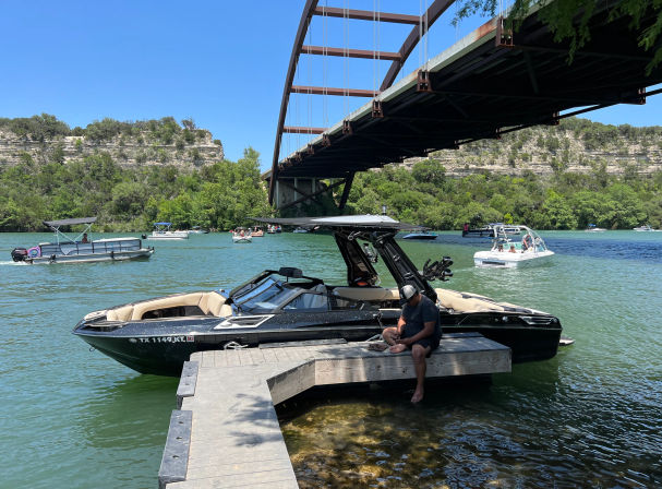Wakesurfing on Lake Austin with Austin Premier Boat image 7