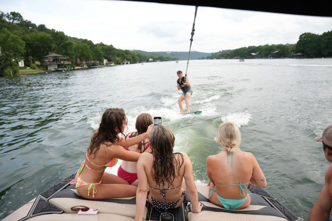 Wakesurfing on Lake Austin with Austin Premier Boat image 4