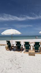 ICONIC Beach Experience: Chair & Umbrella Setup image 9