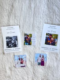Flat-lay of wedding 'Save the Date' photo cards and magnets on white faux-fur background featuring couple photos, event dates and Puerto Vallarta, Mexico location