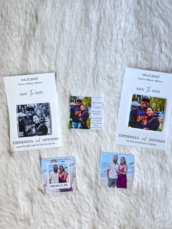 Flat-lay of wedding 'Save the Date' photo cards and magnets on white faux-fur background featuring couple photos, event dates and Puerto Vallarta, Mexico location