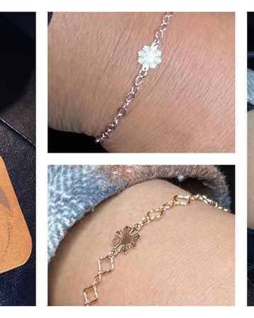 Close-up wrist jewelry detail: two delicate chain bracelets (one silver, one gold) with small textured sunburst flower charms, styled as stackable everyday accessories.