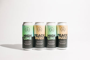 Four tall cans of Delta-9 THC–infused seltzer in lime and peach flavors, two of each, chilled with condensation and lined up on a clean white background — bright studio product shot.