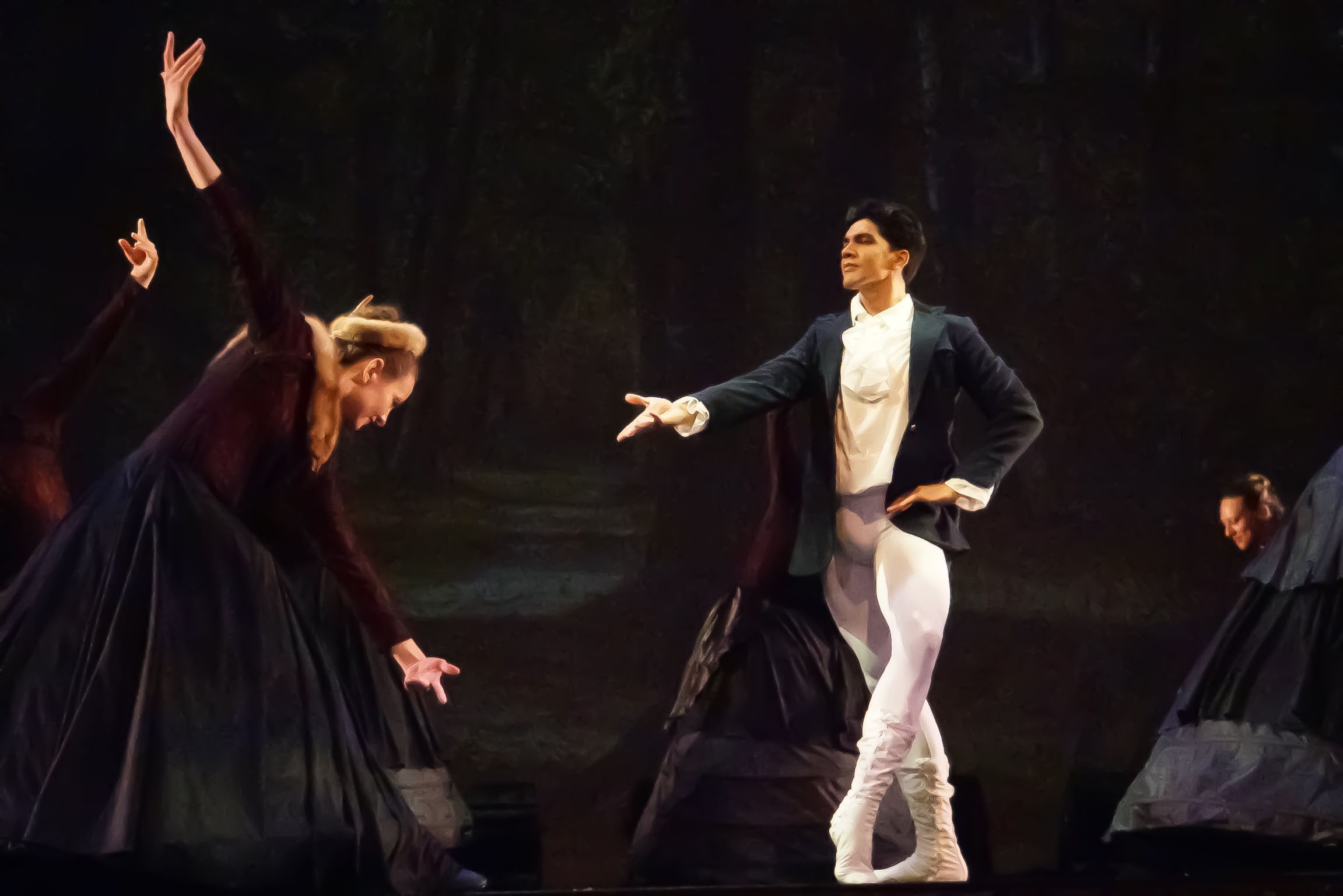 Classical ballet on a theater stage: male dancer in tailcoat and white tights strikes a dramatic pose toward bowing female dancers in dark period skirts against a painted forest backdrop.