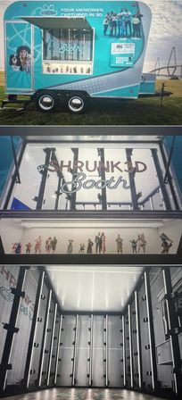 Playful turquoise mobile 3D photo‑booth trailer parked on a grassy field with a bridge in the background, front window showing tiny 3D figurines and interior vertical LED rig for full‑body scanning.