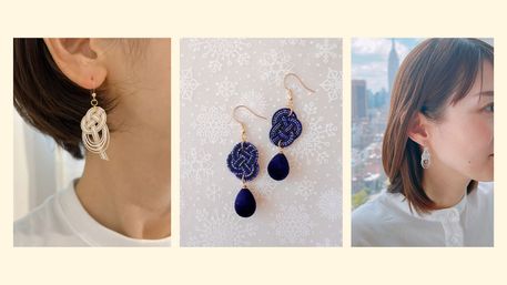 Three-panel collage of handmade statement earrings: left close-up of a cream braided knot dangle worn on an ear, center navy braided knot earrings with navy teardrop beads on a snowflake backdrop, right silver loop earrings worn with a blurred city skyline view in the background.