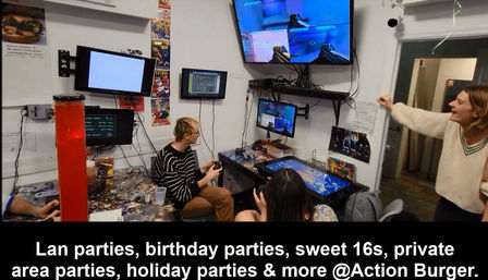 Indoor gaming lounge with wall-mounted TVs and monitors, people playing at LAN-party tables with controllers and promo text for birthday and holiday parties.