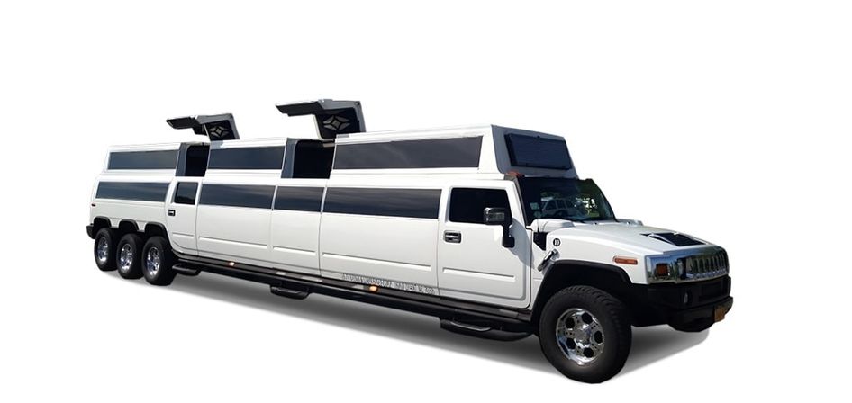 White stretch Hummer limousine with chrome wheels and six-wheel rear, extended luxury party limo with raised gullwing roof panels, isolated on white background