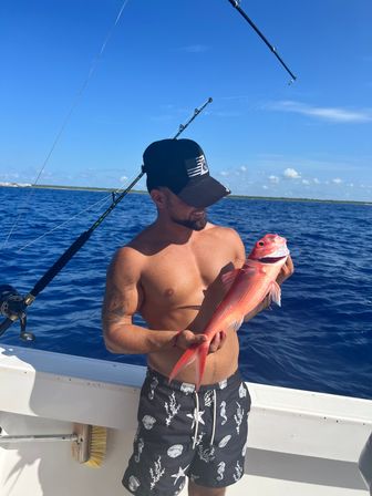 Private Sport Fishing Experience to Isla Mujeres (55ft Boat + Drinks & Equipment) image 6