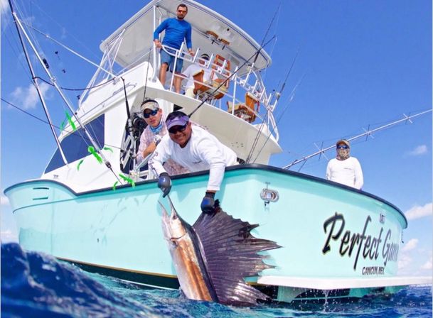 Private Sport Fishing Experience to Isla Mujeres (55ft Boat + Drinks & Equipment) image 8