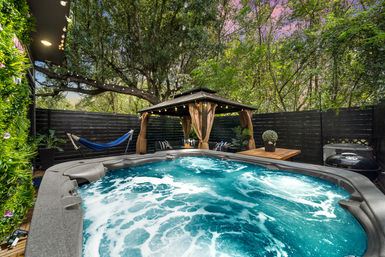 The Black House: Downtown Escape with Hot Tub, Chef, Stylish Decor, Massage & Mixology Class image 35