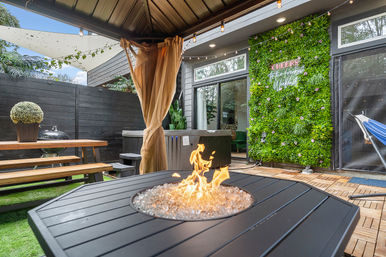 The Black House: Downtown Escape with Hot Tub, Chef, Stylish Decor, Massage & Mixology Class image 1