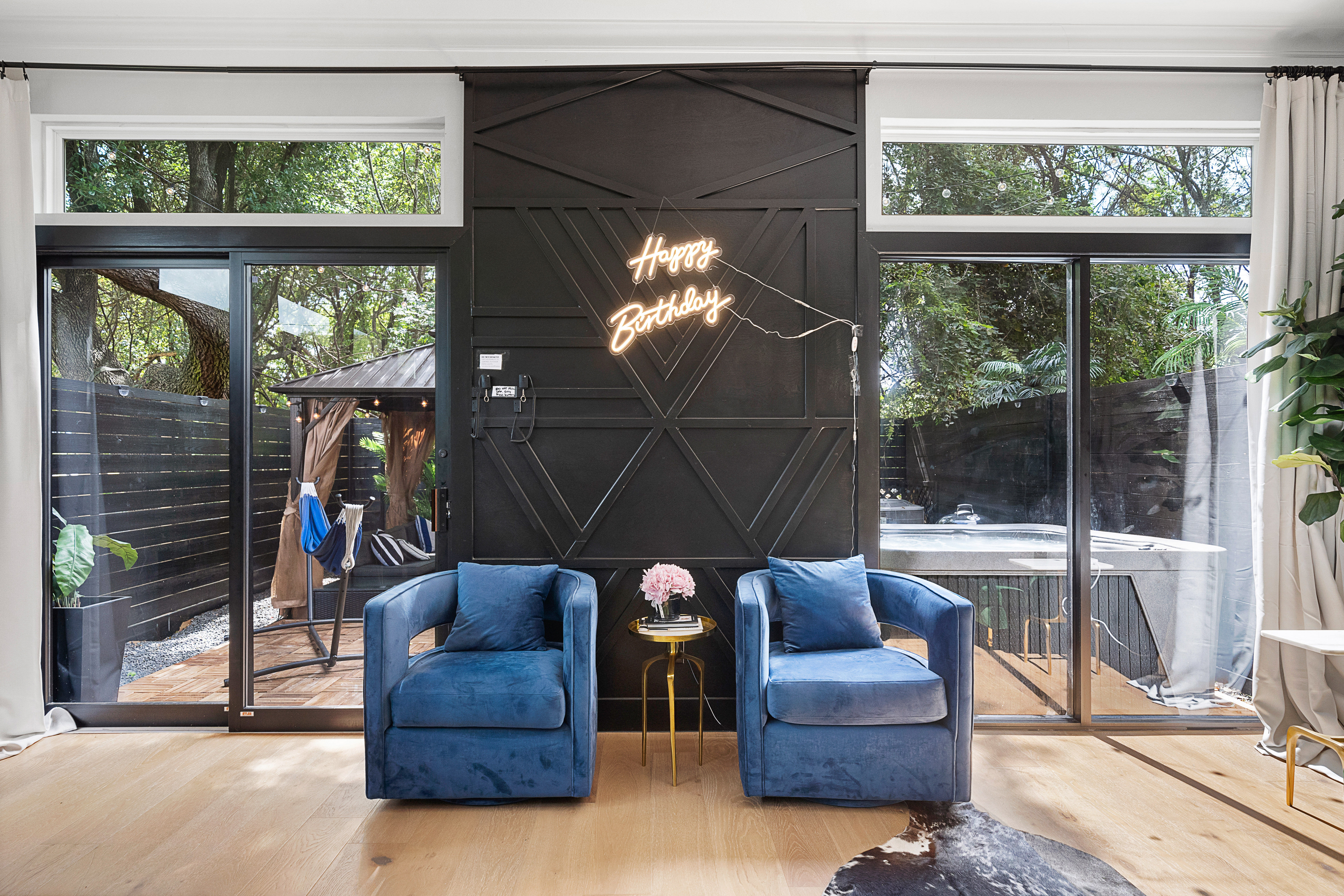 The Black House: Downtown Escape with Hot Tub, Chef, Stylish Decor, Massage & Mixology Class image 2