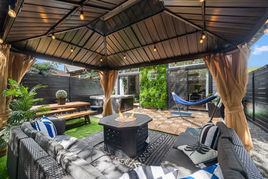 The Black House: Downtown Escape with Hot Tub, Chef, Stylish Decor, Massage & Mixology Class image 37