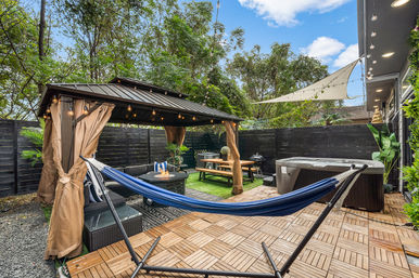 The Black House: Downtown Escape with Hot Tub, Chef, Stylish Decor, Massage & Mixology Class image 38