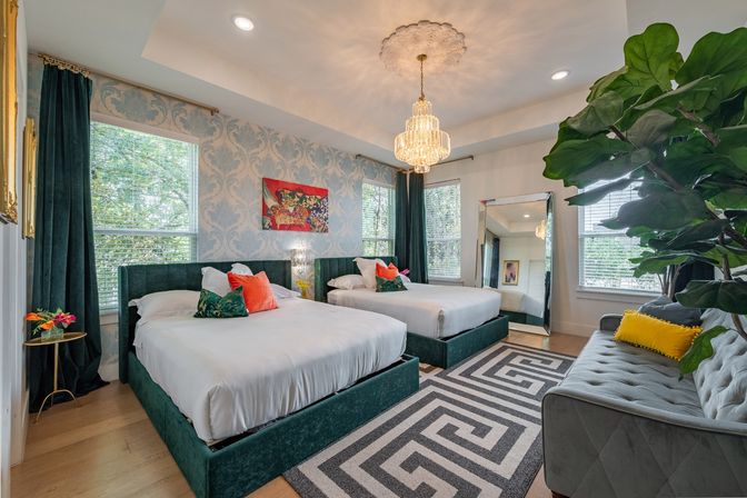 The Black House: Downtown Escape with Hot Tub, Chef, Stylish Decor, Massage & Mixology Class image 1