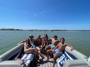 BYOB Pontoon Party Boat in St. Pete with Expert Crew, Scenic Views, Insta-Worthy Floats, and More! image 16