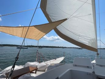 A Lovely Morning or Afternoon of Sailing with a Swim aboard a Classic Mahogany Trimaran Cosmos image 3