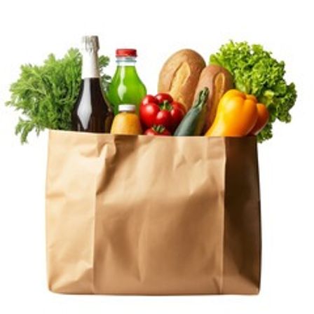 Brown paper grocery bag overflowing with fresh produce and groceries: leafy lettuce, tomatoes, cucumber, yellow bell pepper, baguette and bottled drinks