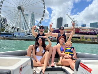 Fun For All: Private Boat in Miami, Celeb Homes, Dolphins & Snorkel Fun image