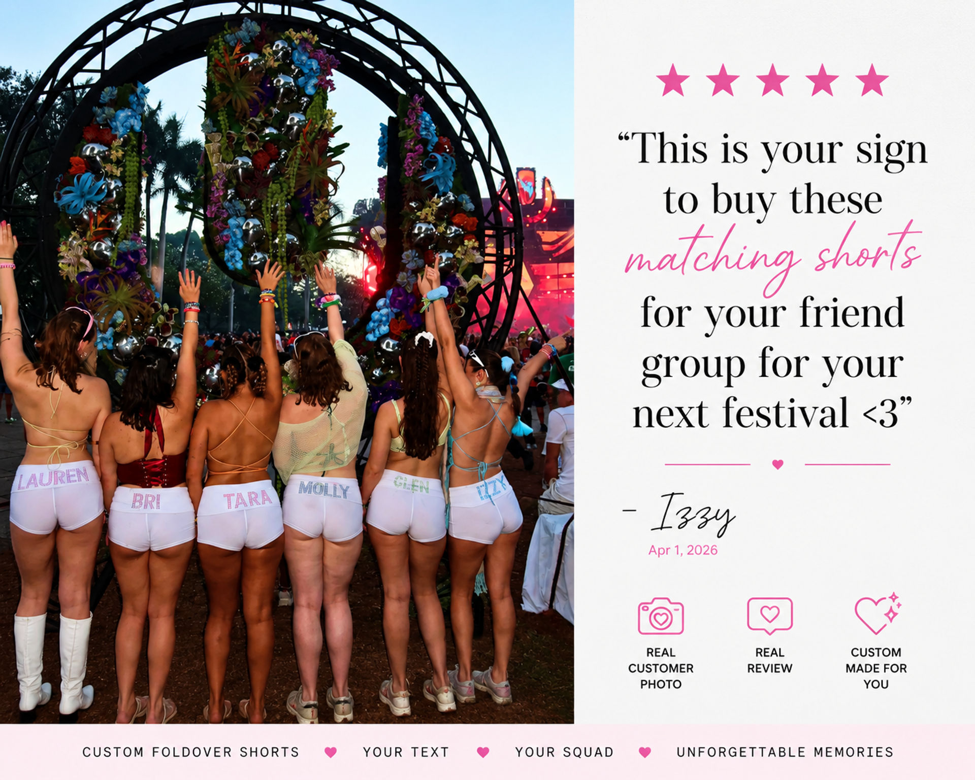 Group of friends at an outdoor music festival seen from behind, wearing matching custom white foldover shorts and colorful tops with arms raised toward a floral-decorated arch and illuminated stage at dusk