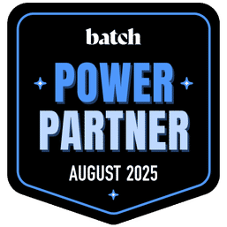 Shield-shaped black partner badge with blue trim and sparkle icons, bold blue text reading "POWER PARTNER" and white text "AUGUST 2025", styled as an award emblem.