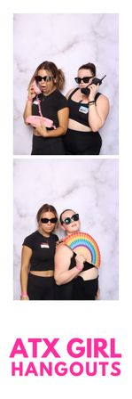 Playful Austin, TX photo-booth portrait of two women in black activewear and sunglasses — one on a pink retro handset, the other on a vintage brick phone; second frame shows them posing with a rainbow fan against a soft marble backdrop.