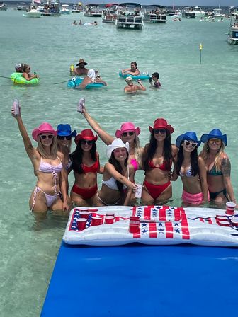 Boat charter company with captain. We provide all your needs for a bachelorette party! 4 or 6 hours at Crab Island getting served drinks by our team while you create memories of a lifetime. image 7