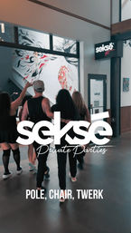 Friends walking into a modern dance studio lobby with a colorful wall mural and signage, promoting private parties and pole, chair, twerk classes.